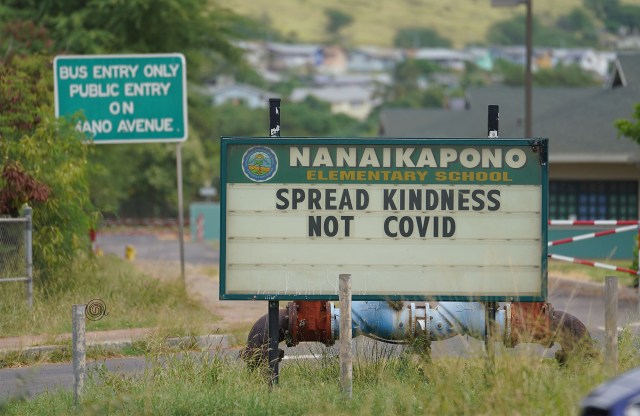 Nanaikapono Elementary School sign. Spread Kindness Not Covid, during COVID-19 pandemic. December 9, 2020