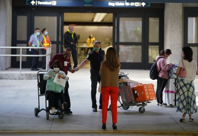 VIsitors arrive from an inbound arrival from Haneda, Japan at Daniel K. Inouye International Airport.