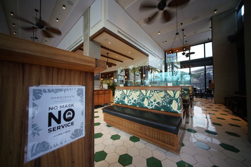 Merriman’s restaurant sign ‘No Mask No service’ at the entrance area during the COVID-19 pandemic.