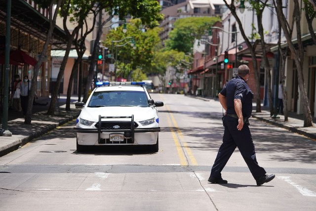 HPD patrol car and officer near the Chinatown HPD substation.