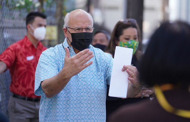 Mayor RIck Blangiardi gestures during press conference announcing repairs of roads in Kakaako.