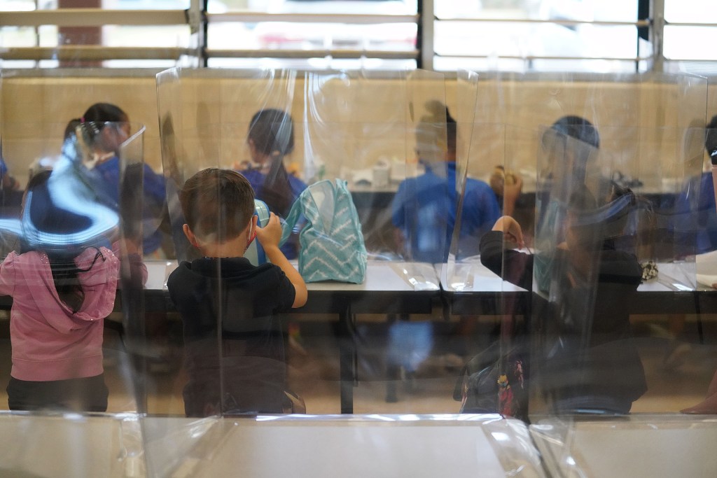 Holomua Elementary School student enjoys their lunch in the cafeteria.