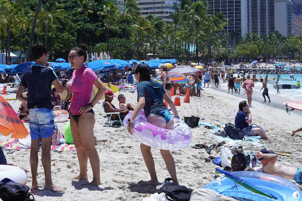 Waikiki Beach was packed with beachgoers as Hawaii was experiencing an uptick in COVID-19 cases statewide.