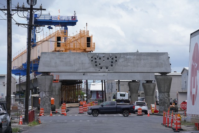 Rail guideway construction on Ualena Street near the Lagoon Drive intersection.