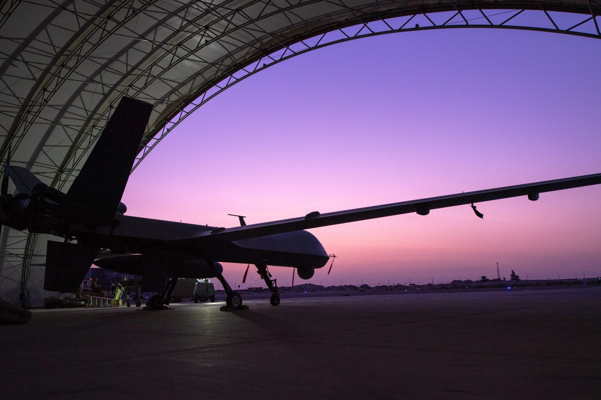 A U.S. Air Force MQ-9 Reaper remotely piloted aircraft awaits an engine test prior to Intelligence, Surveillance, and Reconnaissance operations at Ali Al Salem Air Base, Kuwait, July 23, 2019. Reaper’s are maintained, launched and recovered from deployed locations, but are remotely operated from bases in the United States during ISR operations around the world. (U.S. Air Force Photo by Tech. Sgt. Michael Mason)