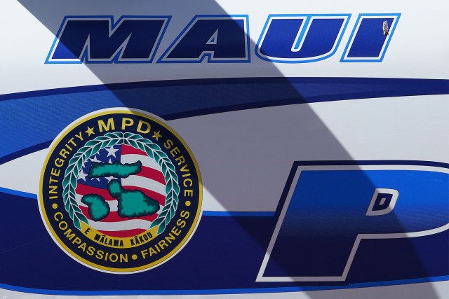 Maui Police Department vehicle parked in downtown Kaunakakai, Molokai.