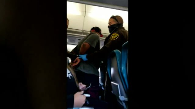Man Arrested On Plane Flight Attendant Assault