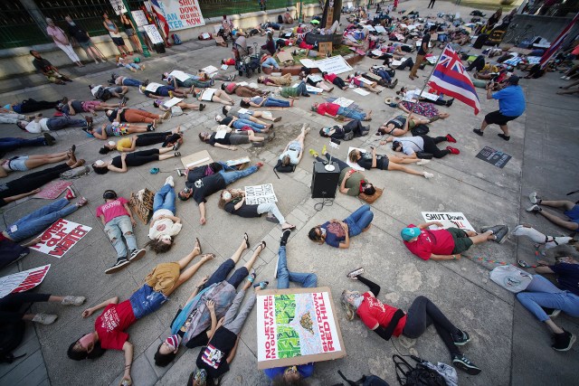 Oahu Water Protector gathered at the Capitol to stage a die-in calling for the shutdown of the Red Hill Bulk Fuel Storage Facility.