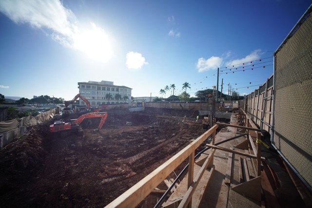 Excavators dig on the foundation at the future Honolulu Civil Beat offices located near Kokohead Avenue.