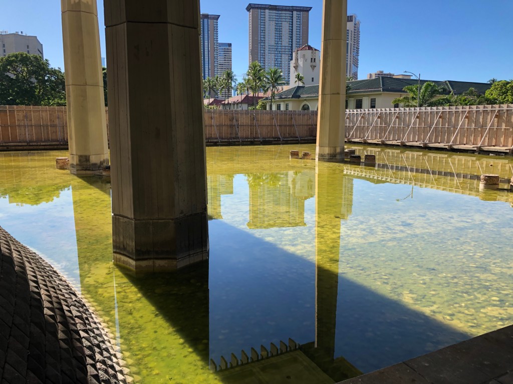 Capitol pool on Diamond Head side with construction / security barrier, Jan 2022