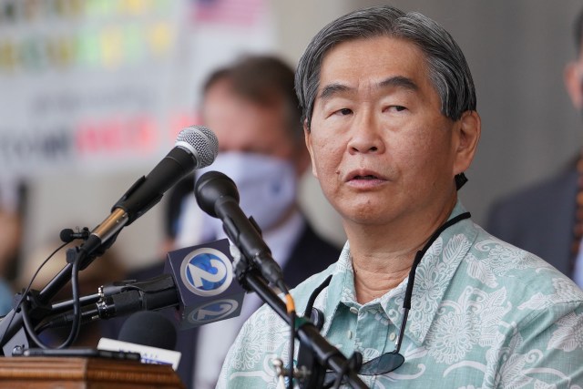 Board of Water Supply Ernie Lau speaks during a Red Hill fuel tank rally held at the Capitol.