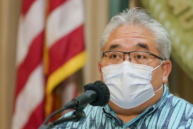 DOE Acting Superintendent Keith Hayashi speaks during a press conference held at Governor Ige's office.