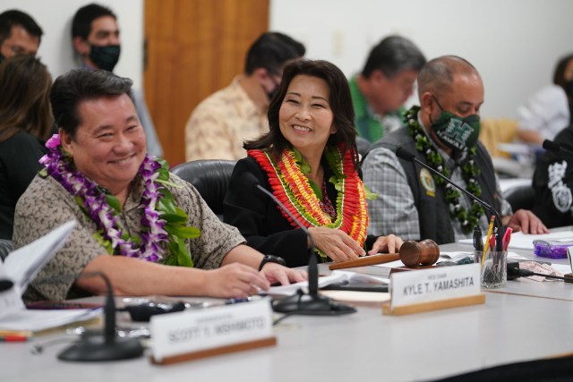 Finance Chair Sylvia Luke is flanked by right, Senator Dela Cruz and left, Representative Kyle Yamashita during joint House and Senate budget conference committee meetings held at the Capitol.