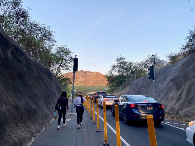 Cars pour into Diamond Head crater on first day of a new reservation system.
