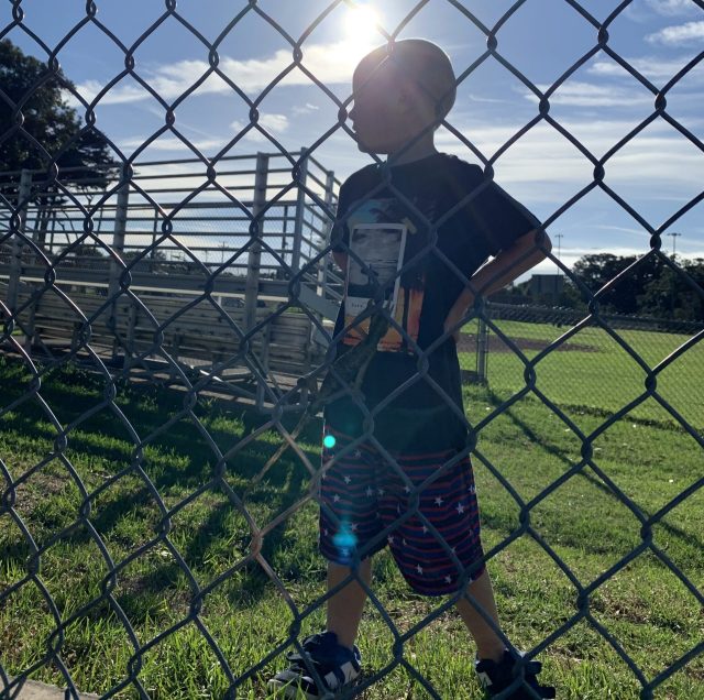 J.J. at a Big Island ballpark on the day his grandmother found out he'd been adopted by his foster family.