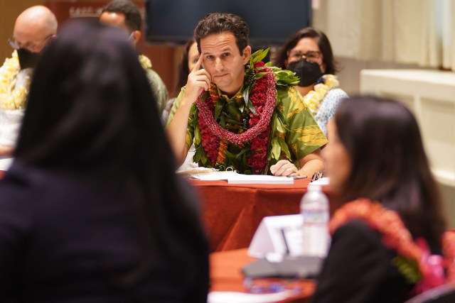 Senator Brian Schatz listens during a field hearing held at the East West Center Auditorium.