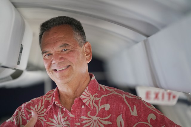 Mokulele Airlines Executive Vice President Richard Schuman in their Saab aircraft at Daniel K. Inouye International Airport.