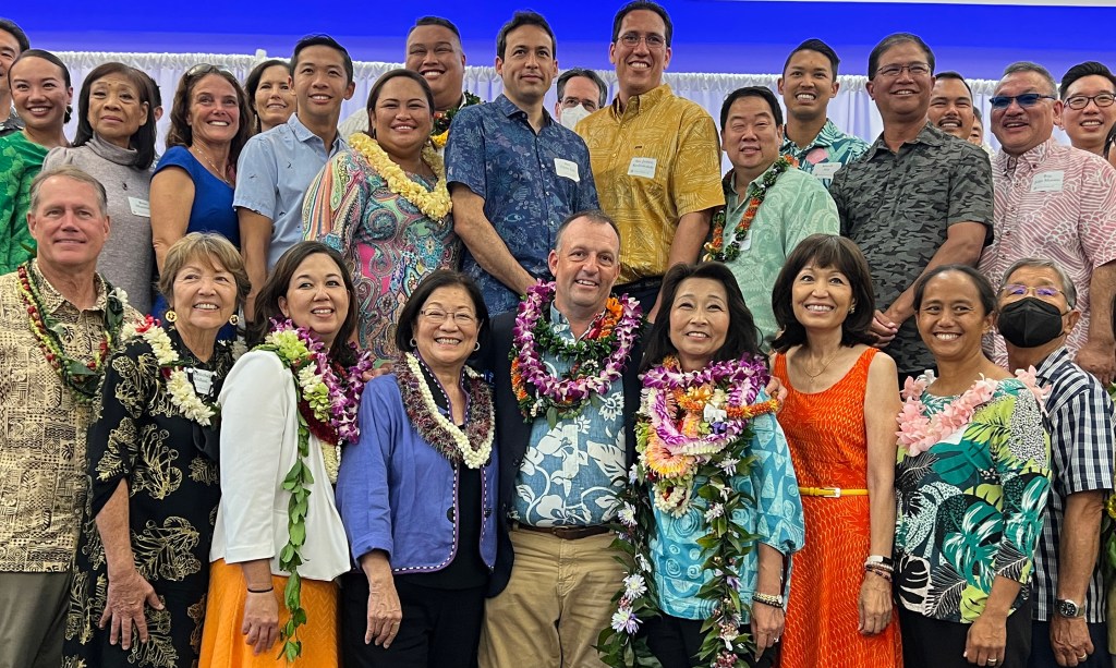 Democratic candidates gathering on stage during the Democratic Party of Hawaii Unity Breakfast. Civil Beat photos Ronen Zilberman.