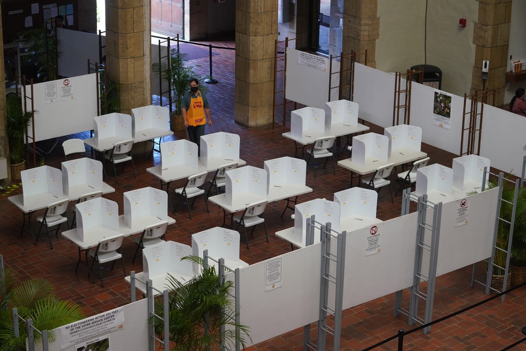 Honolulu Hale view of the tables setup on the ground floor for the 2022 primary election. This photograph was made before the precinct was open to the public.