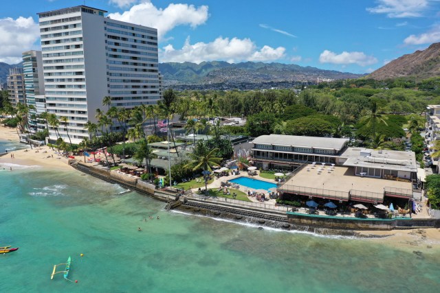 Outrigger Canoe Club, left, and Elk's Club, center with pool, face the effects of rising seas.