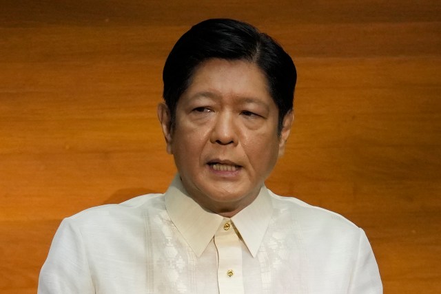 Philippine President Ferdinand Marcos Jr. delivers his first state of the nation address in Quezon city, Philippines, Monday, July 25, 2022. Marcos Jr. said it's wrong to describe his late father as a dictator and that his brutal martial law rule in the 1970's was not meant to prolong his grip on power, comments that were immediately rejected by human rights activists. (AP Photo/Aaron Favila-Pool)