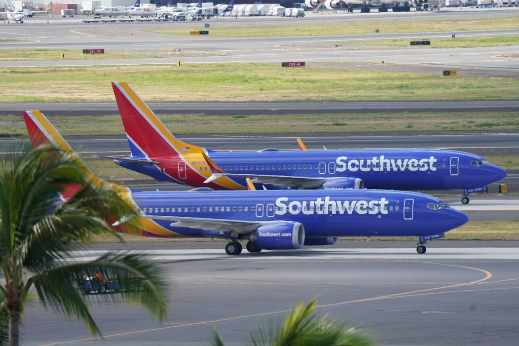 Southwest Airlines aircraft as one aircraft taxis to takeoff at Daniel K. Inouye International Airport.