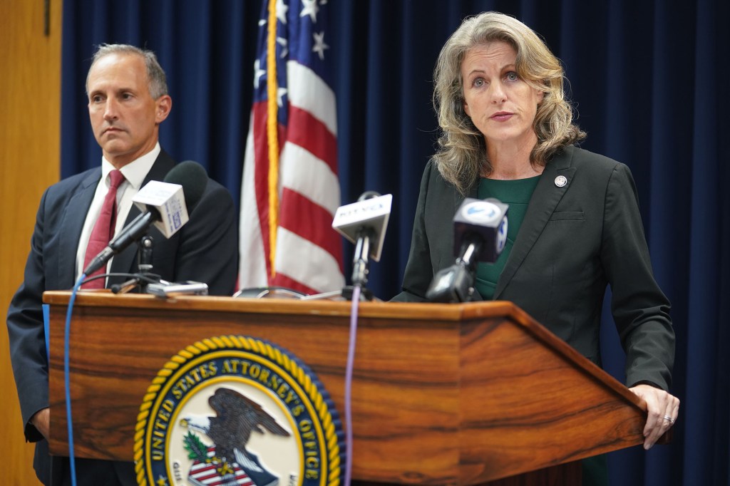 US Attorney Clare E. Connors and left, FBI Special Agent in Charge Steven Merrill duriing a press conference announcing charges against Stewart Olani Stant and Milton Choy.