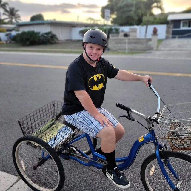 Josh Conner shows off his adult tricycle