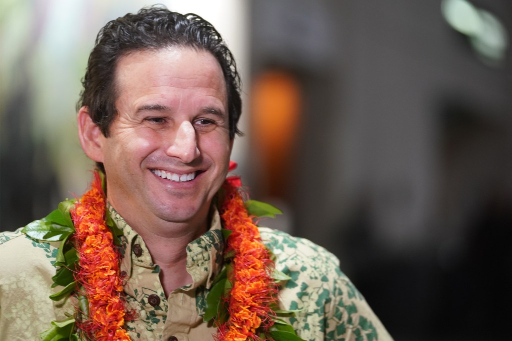 Senator Brian Schatz speaks to media at the Hawaii Convention Center.