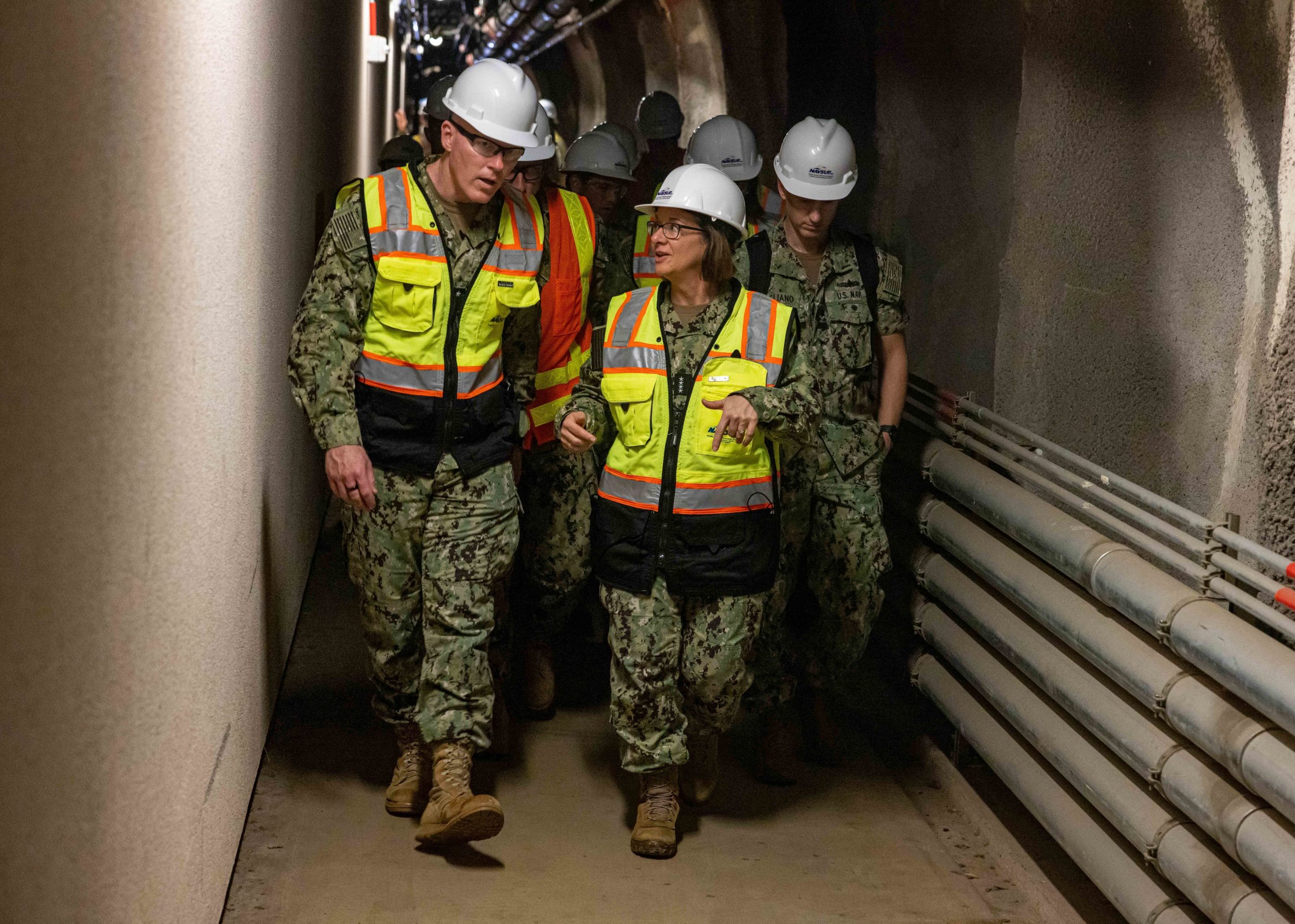 221214-N-OT701-1009 JOINT BASE PEARL HARBOR-HICKAM (Dec. 14, 2022) Joint Task Force Red Hill Commander Vice Admiral John Wade speaks with Vice Chief of Naval Operations Adm. Lisa M. Franchetti during a site visit to the Red Hill Bulk Fuel Storage Facility. Franchetti met with local military leadership during her visit to Navy Region Hawaii to discuss Sailor quality of service, shore infrastructure, and supporting our Sailors and their families. (U.S. Navy photo by Mass Communication Specialist 2nd Class Greg Hall)