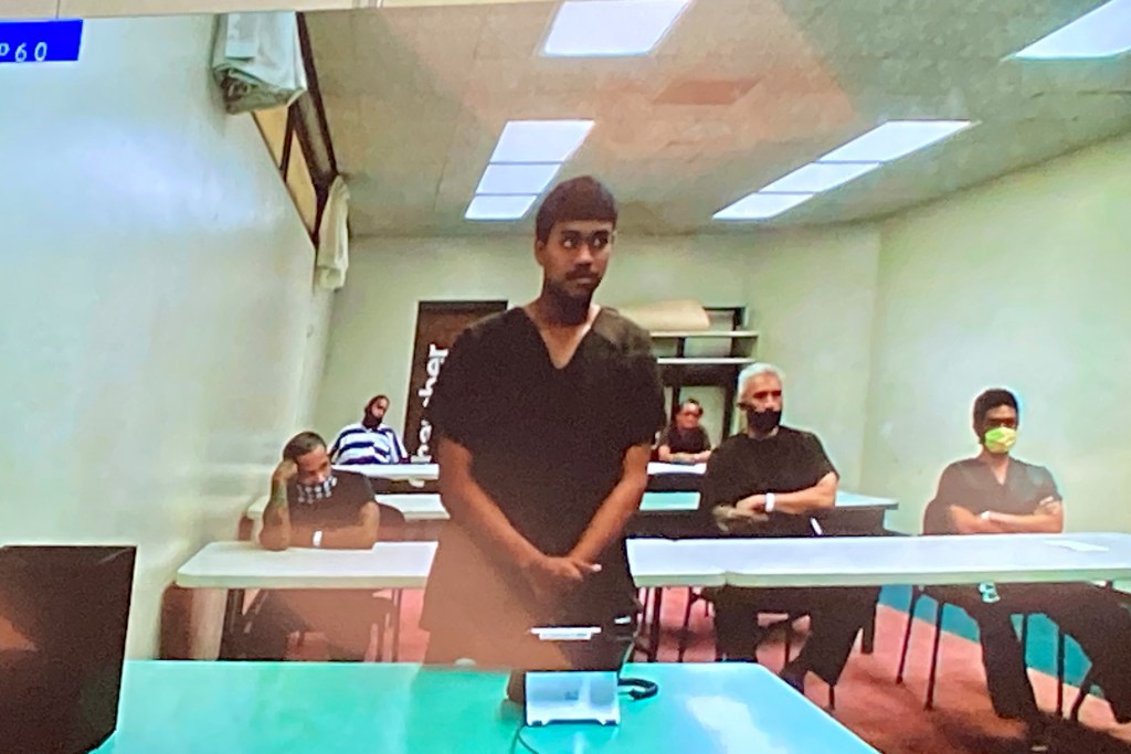 Jacob Borge appears in court for an arraignment via video in Honolulu, Thursday, April 27, 2023. Borge pleaded not guilty to murder and other charges stemming from a shooting at a Hawaii cockfight. Borge was indicted on 11 felony charges including murder and attempted murder stemming from the April 15, 2023, shooting that left three other people wounded at the illegal cockfight. (AP Photo/Jennifer Sinco Kelleher)