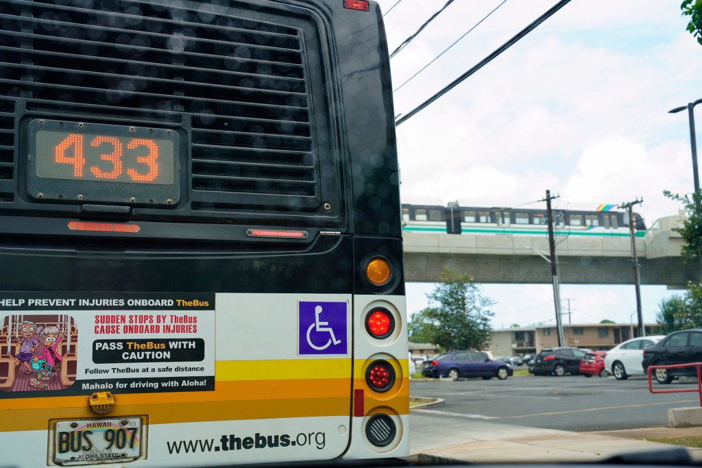 Skyline train rail commuter TheBus bus commuters Pouhala Waipahu Transit Center Station transportation