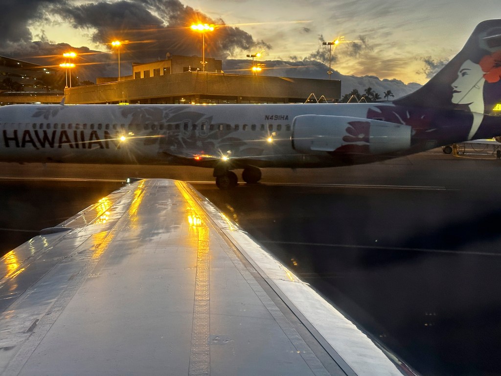 Hawaiian Airlines Boeing 717 jet Daniel K. Inouye International Airport commuter airplane file stock photo airline airplane