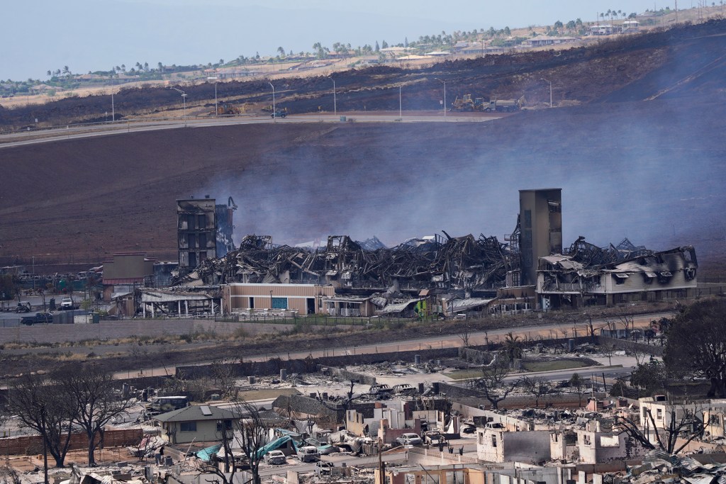 A building continues to smolder after a wildfire destroyed Lahania town Thursday, Aug. 10, 2023, in Maui. (Kevin Fujii/Civil Beat/2023)