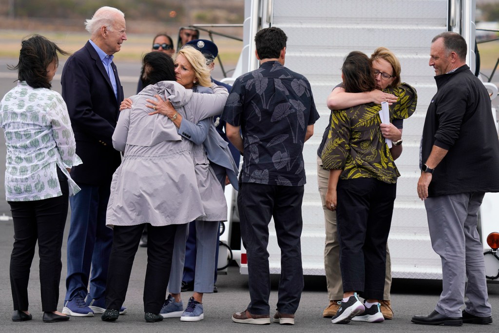 President Joe Biden, Dr. Jill Biden and FEMA administrator Deanne Criswell arrive Monday, Aug. 21, 2023, in Kahului. They are greeted by Rep. Jill Tokuda, from left, Sens. Mazie Hirono and Brian Schatz, Hawaii First Lady Jaime Kanani Green and Gov. Josh Green. The Biden are touring areas of Maui affected by wildfires. (Kevin Fujii/Civil Beat/2023)