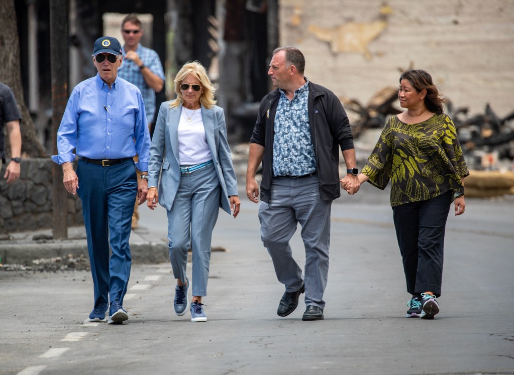 President Biden, First Lady Jill Biden, Gov. Josh Green and his wife, Jaime Green walk down Front Street in Lahaina, Monday. (Nathan Eagle/Civil Beat/2023)