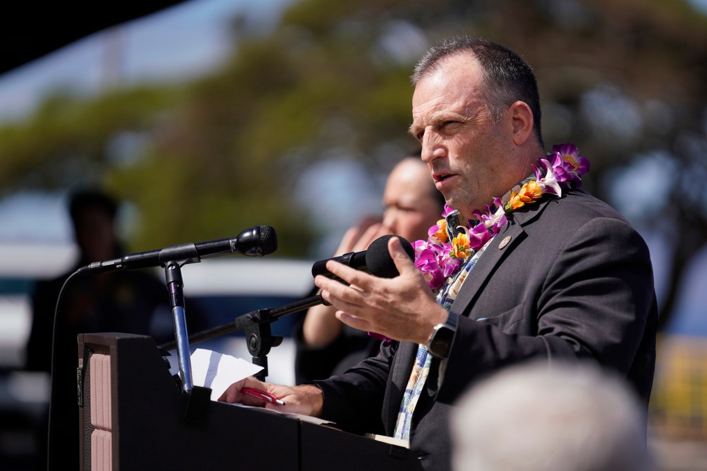 Gov. Josh Green addresses the media during a Hawaii State Department of Education press conference to announce a plan to reopen schools in West Maui on Tuesday, Sept. 26, 2023, at Kapalua Airport in Lahaina. The Army Corps of Engineers will be building a temporary replacement school for King Kamehameha III Elementary. (Kevin Fujii/Civil Beat/2023)