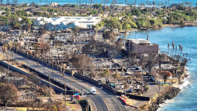 The entrance to Front Street in Lahaina off of Honoapiilani Highway remains barricaded after the Aug. 8 fires. (Nathan Eagle/Civil Beat/2023)