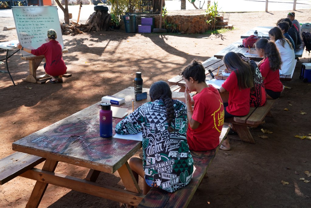 Hawaiian immersion school class for middle-school age children takes place at Hanakao’o Park Wednesday, Oct. 18, 2023, in Lahaina. (Kevin Fujii/Civil Beat/2023)