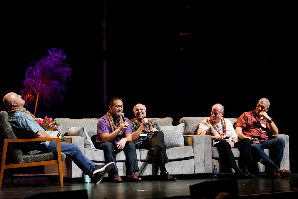 Panel discussion Hawaii’s Mayors: A Collective Commitment to Housing moderator Micah Kane, from left, Kauai Mayor Derek Kawakami, Honolulu Mayor Richard Blangiardi, Hawaii County Mayor Mitch Roth and Maui Mayor Richard Bissen enjoy a light moment Wednesday, Nov. 16, 2023, at the 22nd Native Hawaiian Convention at Maui Arts & Culture Center in Kahului. (Kevin Fujii/Civil Beat/2023)