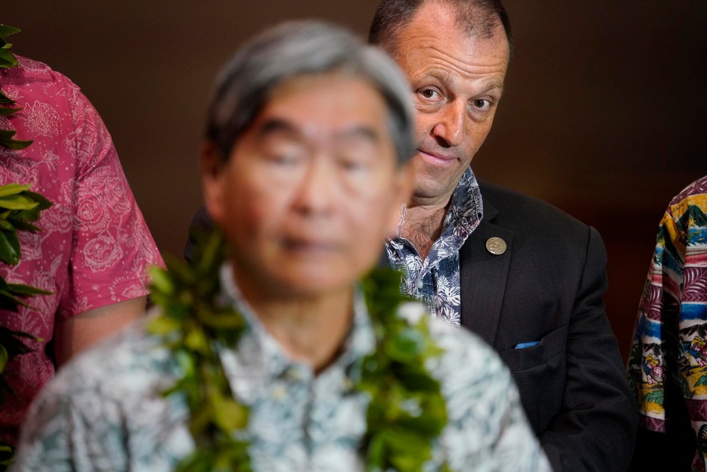 Gov. Josh Green listens to Honolulu Board of Water Supply Chief Engineer Ernest Lau during the Red Hill Water Initiative (WAI) group’s final report Tuesday, Nov. 28, 2023, in Honolulu. Red Hill WAI is a group of state and city leaders to make sure the U.S. Navy and federal government remove and protect Oahu’s aquifers. (Kevin Fujii/Civil Beat/2023)
