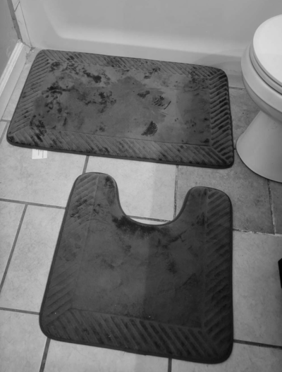 The floor of the bathroom where an infant was found dead in Makaha Valley.