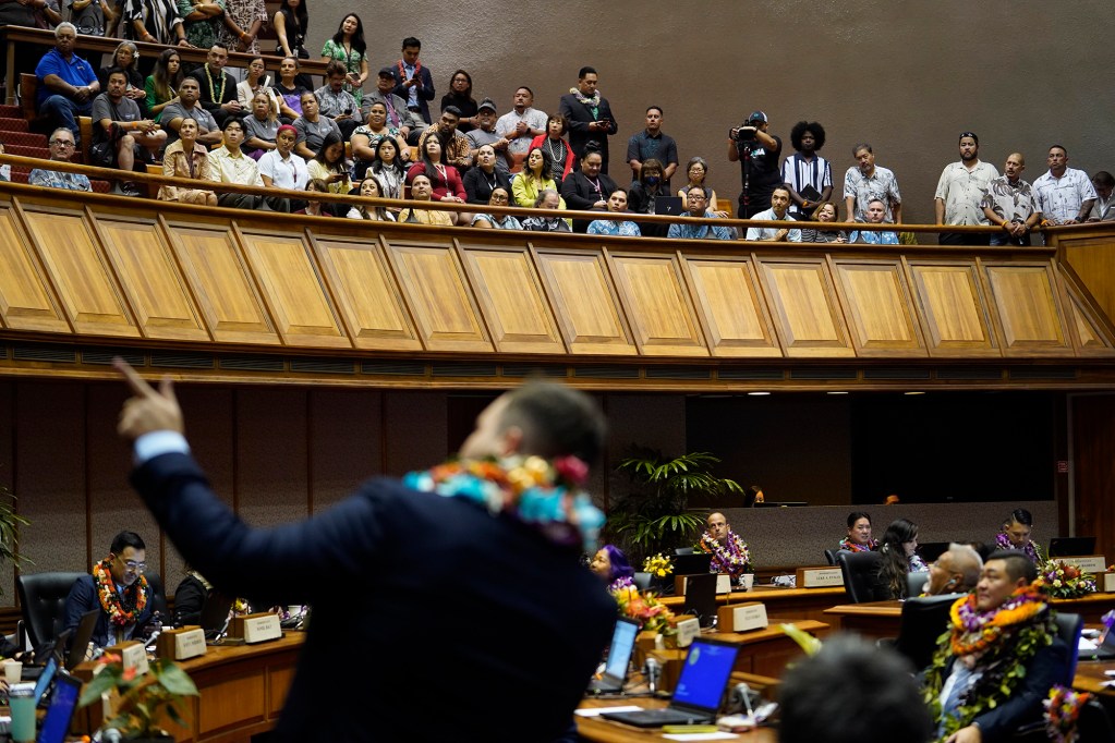 The House of Representatives majority whip Chris Todd recognizes people in the gallery during the opening of the legislative session Wednesday, Jan. 17, 2024, in Honolulu. (Kevin Fujii/Civil Beat/2024)