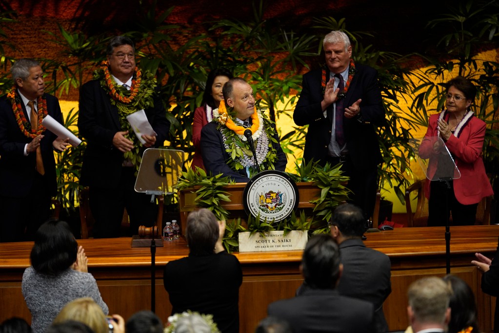 Gov. Josh Green arrives to a standing ovation before delivering the state of the state address Monday, Jan. 22, 2024, in Honolulu. Gov. Green highlighted affordable housing, Maui recovery, homelessness, health care, education among other items he’ll present to the legislature this session. (Kevin Fujii/Civil Beat/2024)