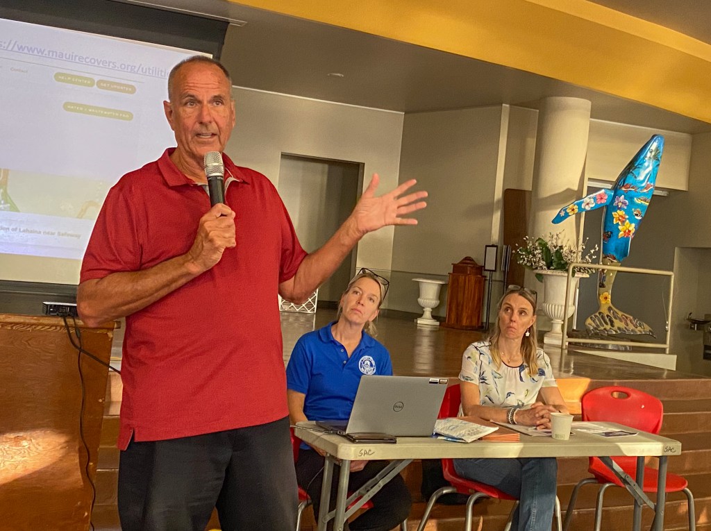 John Stufflebean, director of the Maui County Department of Water Supply, spoke at a public meeting about a new Water Shortage and Conservation Plan at Lahainaluna High School as Maui County's Eva Blumenstein, planning program manager for the Department of Water Supply, and Carollo Engineers' water resources practice director Inge Wiersema listen.