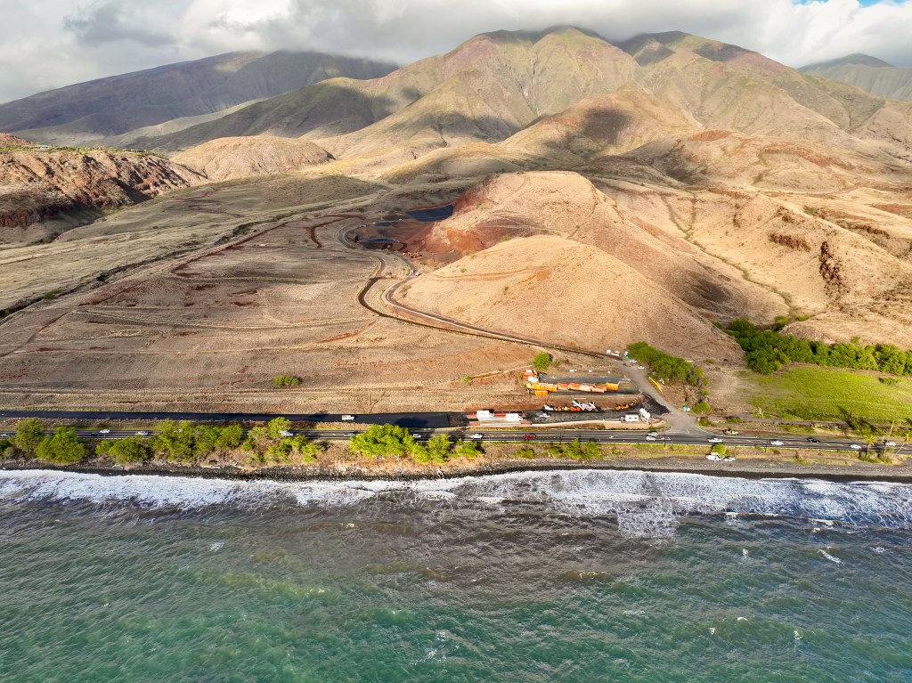 Construction crews were preparing the temporary dump site in Olowalu for the estimated 400,000 tons of debris and toxic ash from the Aug. 8 wildfire in Lahaina, Thursday. (Nathan Eagle/Civil Beat/2024)