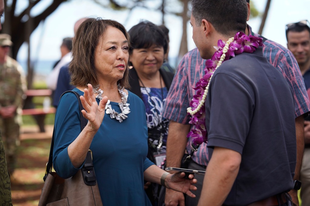 Maui County Council member vice-chair Yuki Lei Sugimura talks with Transportation Secretary Pete Buttigieg on Wednesday, Feb. 21, 2024, in Lahaina. (Kevin Fujii/Civil Beat/2024)