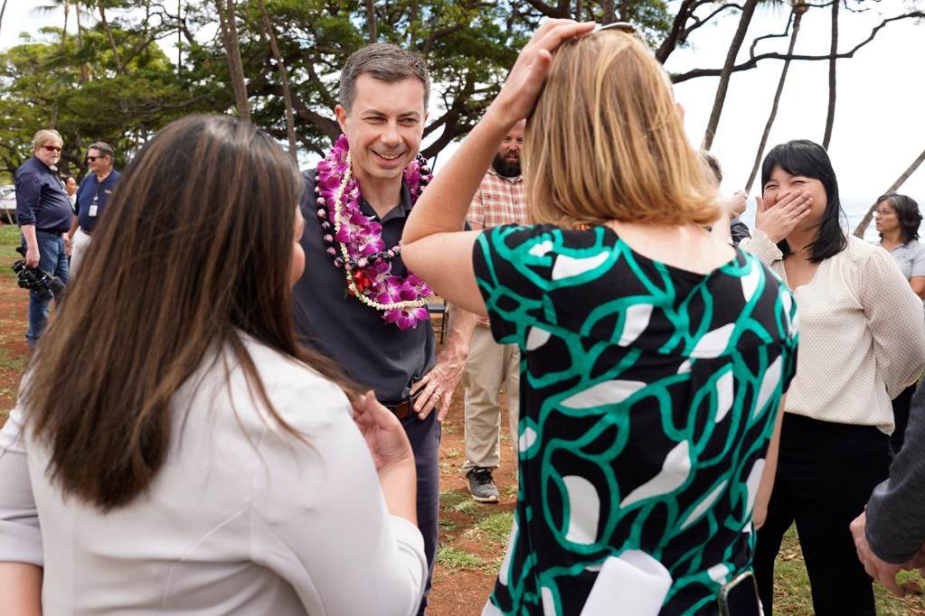Transportation Secretary Pete Buttigieg meets with two of his local engineers Meesa Otani and Lisa Powell at Launiupoko Beach Park Wednesday, Feb. 21, 2024, in Lahaina. (Kevin Fujii/Civil Beat/2024)
