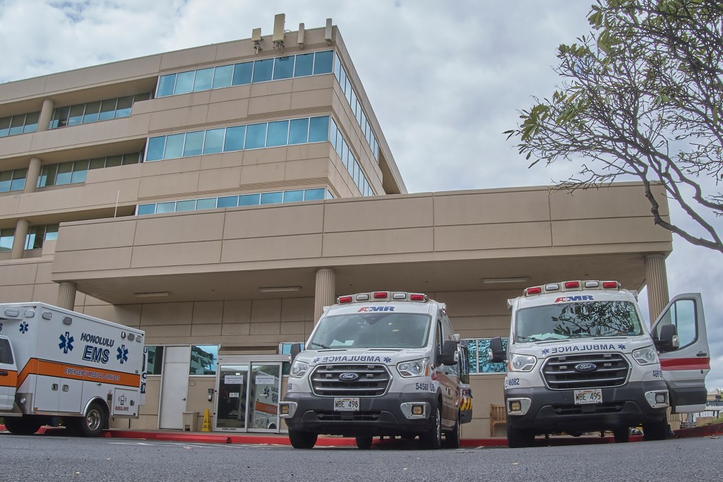 City & County EMS Director Dr. Jim Ireland fields questions from Civil Beat’s Ben Angarone during an EMS ridealong March 18th, 2024. Ambulances wait to offload patients at various hospitals when the Emergency rooms are full.(David Croxford/Civil Beat/2024)