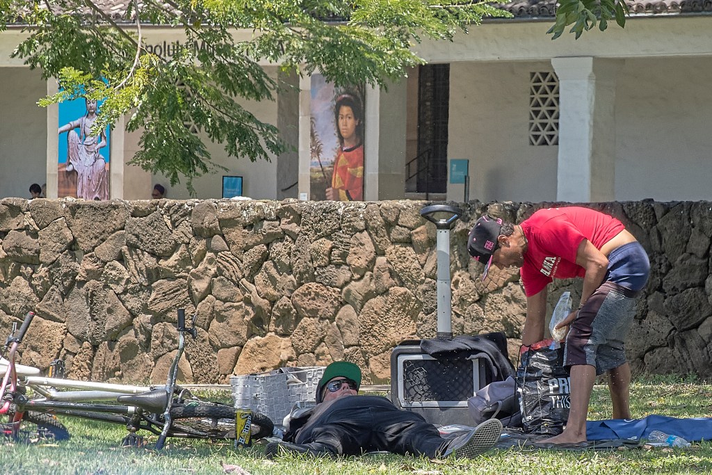 While photographing the homeless in Thomas Square and while they can be frequently found in the area of the restrooms, it became apparent that they were also under the watchful eyes of the exhibitions at the Honolulu Museum of Art. (David Croxford/Civil Beat/2024)